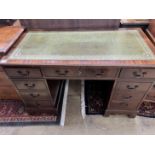 A reproduction mahogany pedestal desk, width 122cm