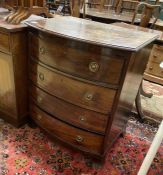 A small Regency style mahogany bow front chest of drawers, width 70cm, depth 54cm, height 79cm