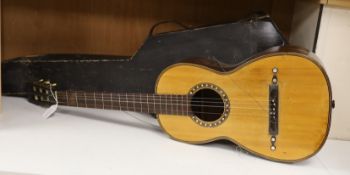 A parlour guitar with hard case. Ivory submission reference: J3WBGCHD