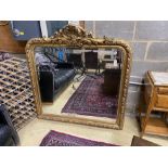 A Victorian style gilt composition overmantel mirror, width 130cm, height 137cm