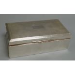 A George V silver mounted rectangular cigarette box, Birmingham, 1928, 17.2cm.