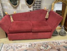 A contemporary Knowle settee with red fabric upholstery, length 200cm, depth 82cm, height 105cm