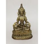 A Buddhist gilt copper alloy figure of a Bodhisattva, 22cm high