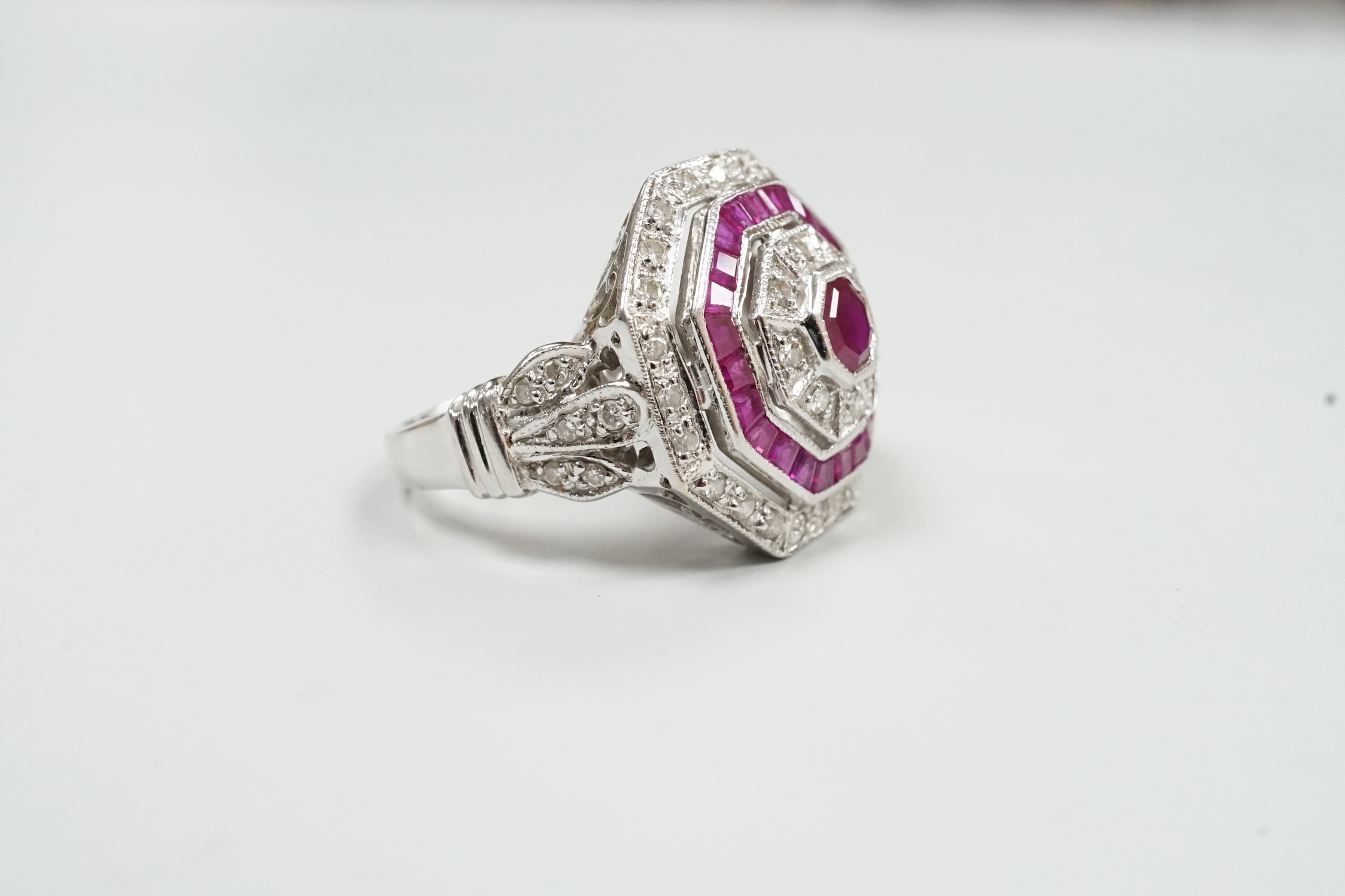 A mid to late 20th century 18ct white gold, ruby and diamond set octagonal cluster target ring, size - Image 3 of 4