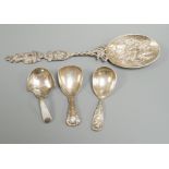 Two 19th century silver caddy spoons, including Birmingham, 1827, one later caddy spoon and an