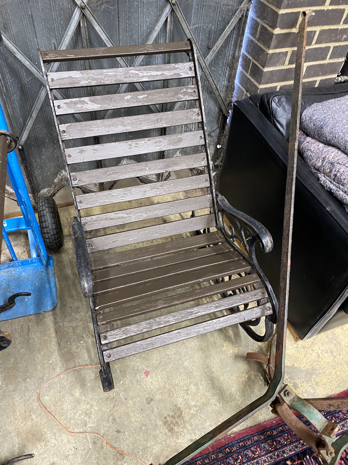 A pair of cast metal slatted wood rocking garden chairs, width 62cm, depth 86cm, height 88cm - Image 2 of 2
