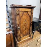 A late Victorian inlaid pine bedside cabinet, width 38cm
