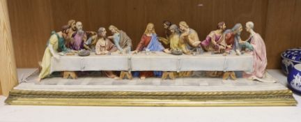 A Capo di Monte figure group of 'The Last Supper', 65cm wide