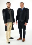 Two 19th century style gentleman's evening tail-suit jackets (large sizes). Ex London Festival Opera