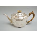 A George III chased oval silver teapot, by Thomas Wallis, London, 1798, gross weight 15.4oz. Ivory