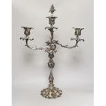 A Victorian plated Elkington & Co two branch, three light candelabrum, 60cm high