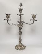 A Victorian plated Elkington & Co two branch, three light candelabrum, 60cm high