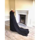 A fine quality lady's black satin, chiffon and jet trimmed Regency style evening dress with long
