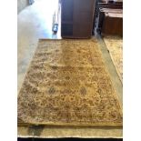 A North West Persian style gold ground carpet, 254 x 170cm