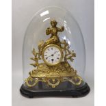 A an ornate figural gilt-spelter mantel clock, under glass dome on stand, 40cm high