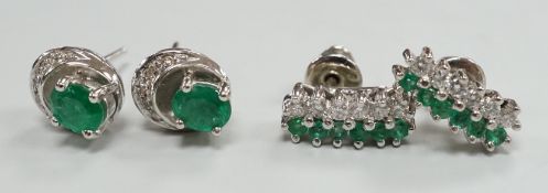 Two moderns pairs of emerald and diamond set ear studs, including white metal two row and 14k oval