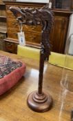 A Chinese carved hardwood “dragon” stand, height 66cm