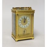 An Edwardian brass carriage timepiece with alarm, 12cm