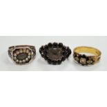 Three assorted Georgian mourning rings, including a 15ct gold, seed pearl and black enamel.