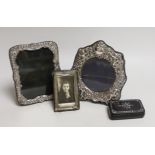 Two silver frames, a glass frame and a papier mache and mother of pearl snuff box