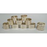 A set of four George V silver oval napkin rings, Mappin & Webb, London, 1925 and six other