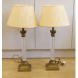 A pair of brass and glass Corinthian column table lamps, 52cm high not including light fitting