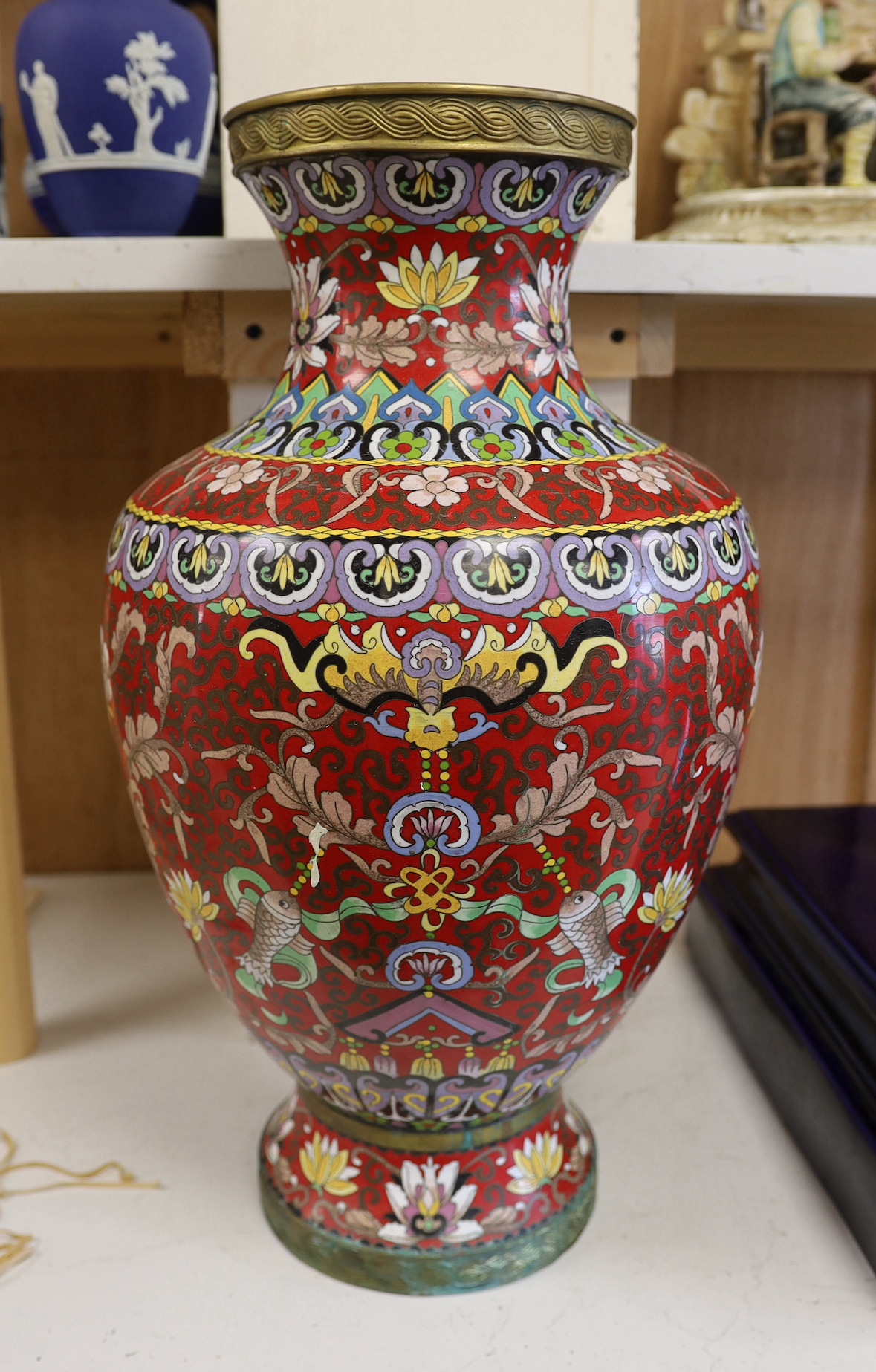 A large Chinese red ground cloisonné enamel vase, 51cm tall