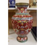 A large Chinese red ground cloisonné enamel vase, 51cm tall