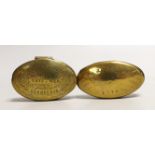 Two early 20th century brass snuff boxes, one with Welsh inscription