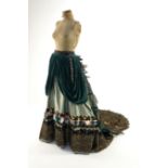 An Edwardian style lady's green taffeta skirt decorated with beaded, sequinned, ribboned border