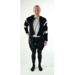 A man's Elizabethan style black smocked velvet and white trim costume, with cod piece and black