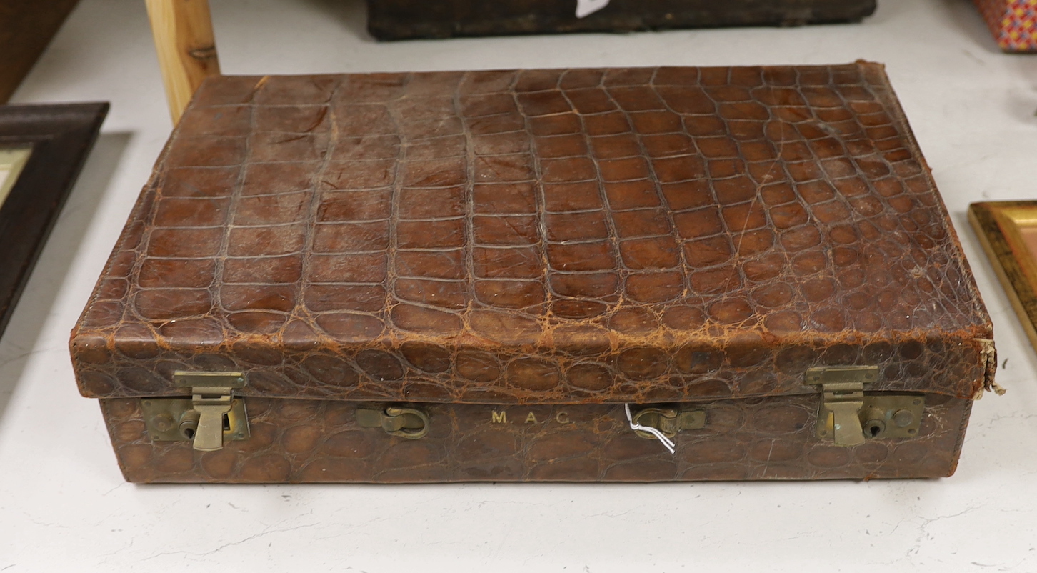 A Finnigans crocodile leather attaché case, pre 1940, with interior figments and blotter, 45cm wide,