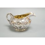 An early Victorian silver cream jug, by Charles & George Fox, London, 1844, length 14.1cm, 6.2oz.