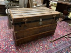 A late 19th century French travelling trunk with interior paper label “A. Bertrand, Paris”, length