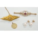 A Victorian 15ct and diamond set brooch, 45mm, a similar 9ct and gem set brooch, a pair of