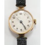 An early 20th century 9ct gold Rolex manual wind wrist watch, with Arabic dial, case diameter