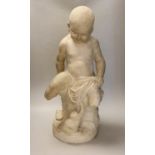 A 19th century French white marble carving of a boy and a cat, 60cm high