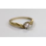 A modern 9ct gold and solitaire diamond ring, size M, gross weight 1.9 grams.