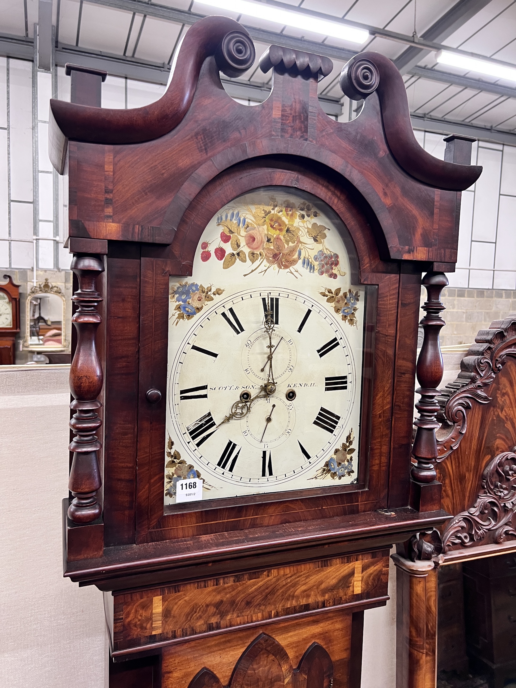 Scott & Son, Kendall. An early 19th century flame mahogany eight day longcase clock, height 230cm