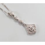 A modern 375 white metal and diamond chip set drop pendant, 23mm, gross 0.6 grams on an 18ct white