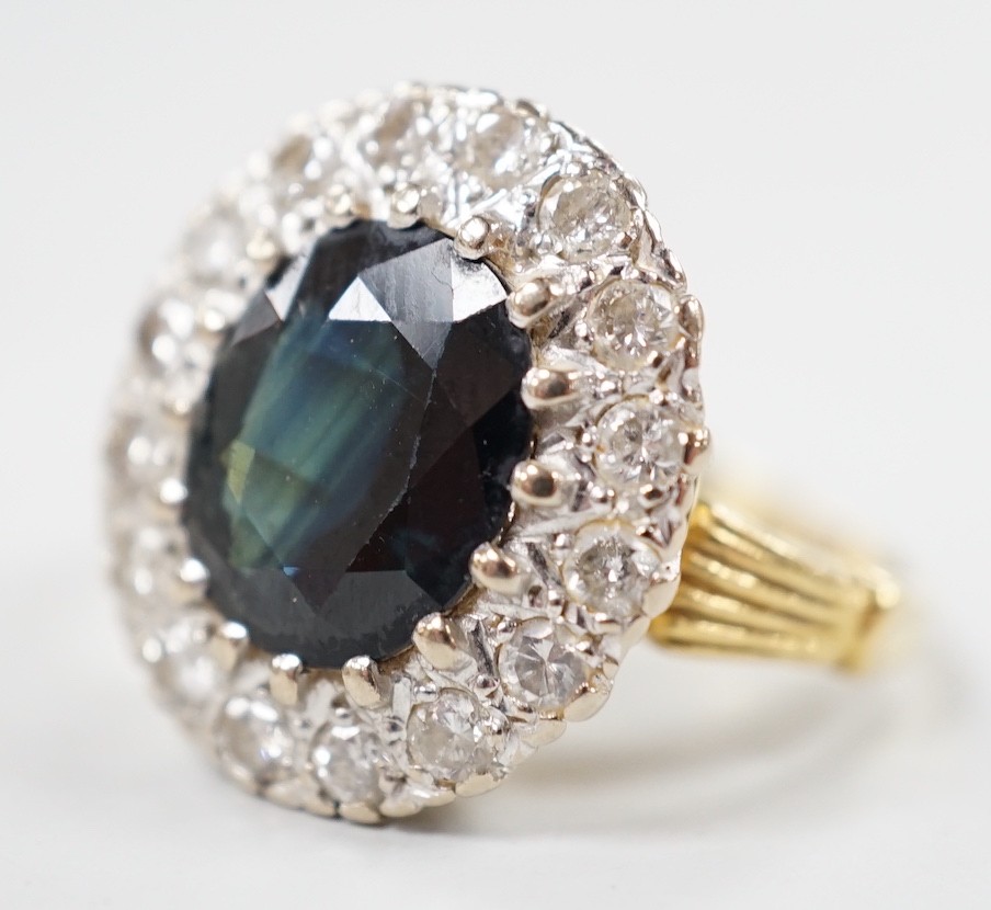 A 1970's? 18ct gold, single stone oval cut sapphire and illusion set diamond cluster ring, size O/P, - Image 2 of 9