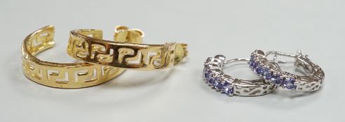 A modern pair of Middle Eastern? pierced yellow metal half hoop earrings, 23mm 6.7 grams and a