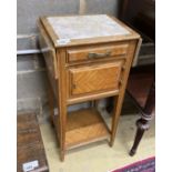 A late 19th century French marble top drop flap bedside cabinet, width 42cm, depth 33cm, height