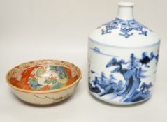 A large Japanese Arita blue and white sake flask and a Kutani bowl, largest 26cm tall