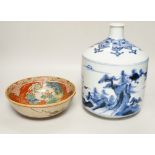 A large Japanese Arita blue and white sake flask and a Kutani bowl, largest 26cm tall