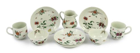 A Worcester ‘Honeysuckle’ pattern part tea and coffee set, c.1755-60, painted in colours with