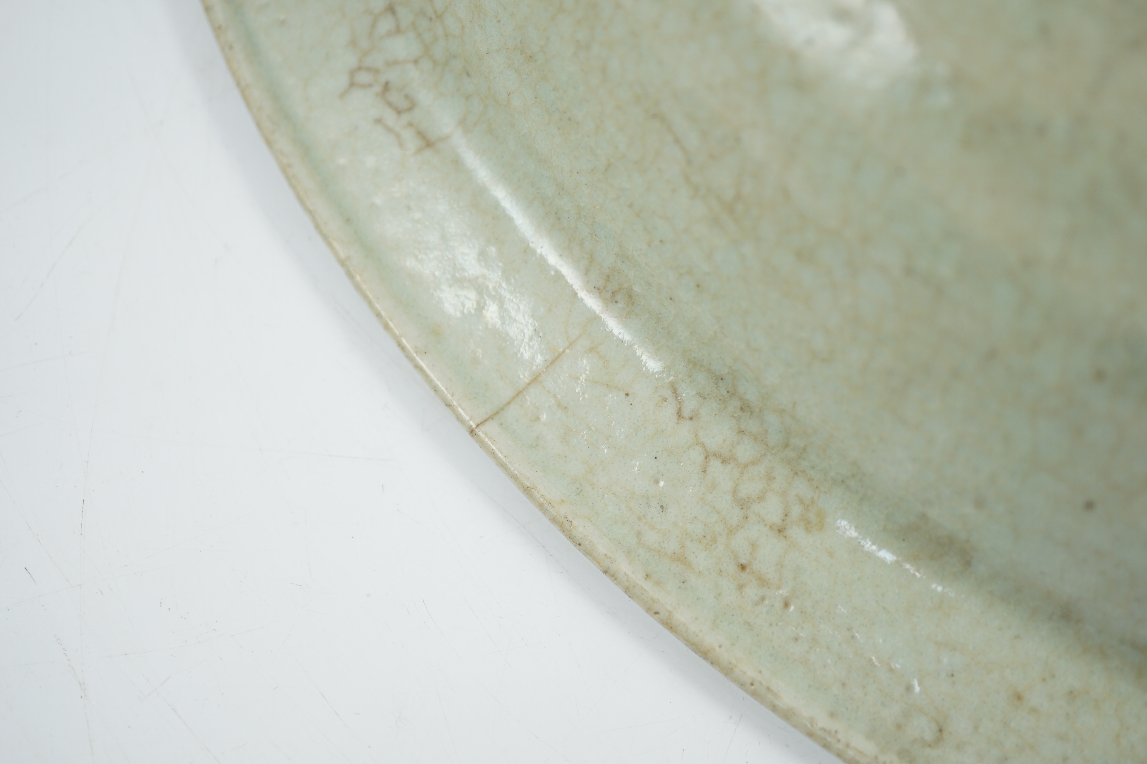 A Chinese Longquan celadon dish, Yuan-Ming dynasty, 13th/14th century, covered in a pale sea green - Image 8 of 10