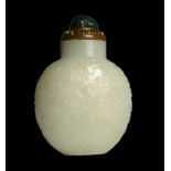 A good Chinese archaistic white jade snuff bottle, 1780-1850, of flattened flask form, well hollowed