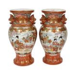 A pair of massive Japanese Kutani vases, Meiji period, each of oviform the neck applied with a