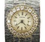 A lady's 1960's 18ct white gold and diamond set Vertex manual wind bracelet watch, with baton